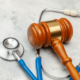 Gavel and stethoscope in a birth injury case