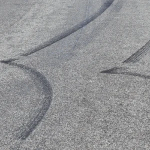 Skid marks on the road from left turn car accidents
